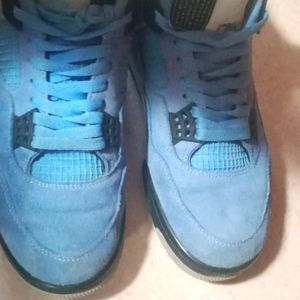 Air Jordan 4s "Universal Blues"